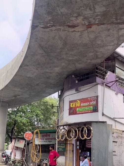 A section of the Indora-Dighori flyover, which slices through the balcony of a Nagpur resident.