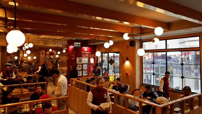 Customers have their meals inside Daryaganj restaurant at a mall in Noida, India, January 23, 2024 | Reuters