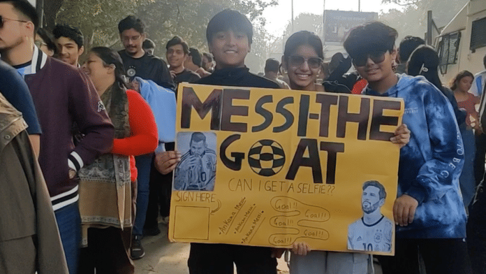 Youngsters with a poster of Lionel Messi outside Arun Jaitley Stadium in New Delhi on Monday | Anu Verma | ThePrint