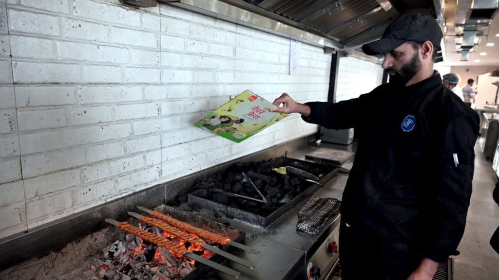 Adana Kebabs being cooked in the kitchen of The Terrace. Suraj Singh | ThePrint
