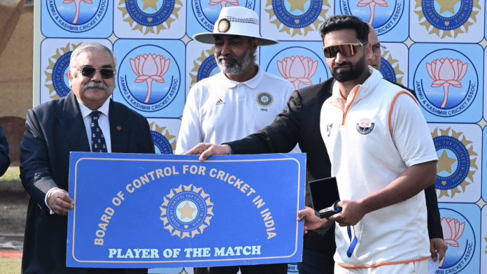 File photo of J&K swing bowler Auqib Nabi receiving Player of the Match award from brigadier Anil Gupta (retired), member BCCI sub-committee JKCA. | Suraj Singh Bisht/ThePrint