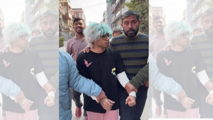 Still from group of men assaulting YouTuber