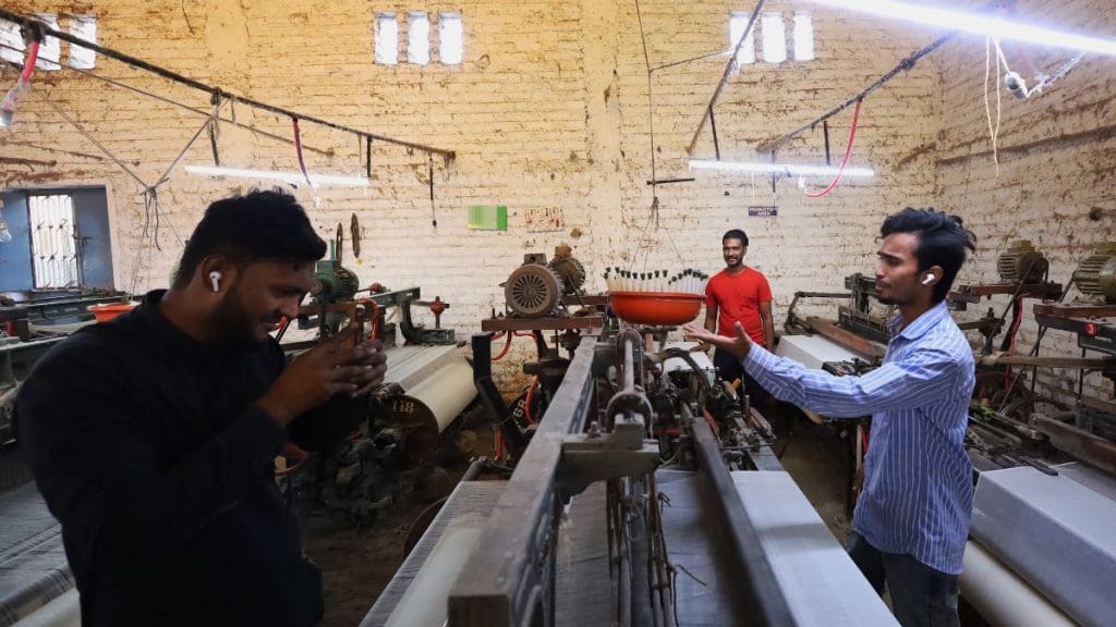 Raees shoots videos of Aadil (blue shirt) and Irfan (in red) looks on. Manisha Mondal | ThePrint