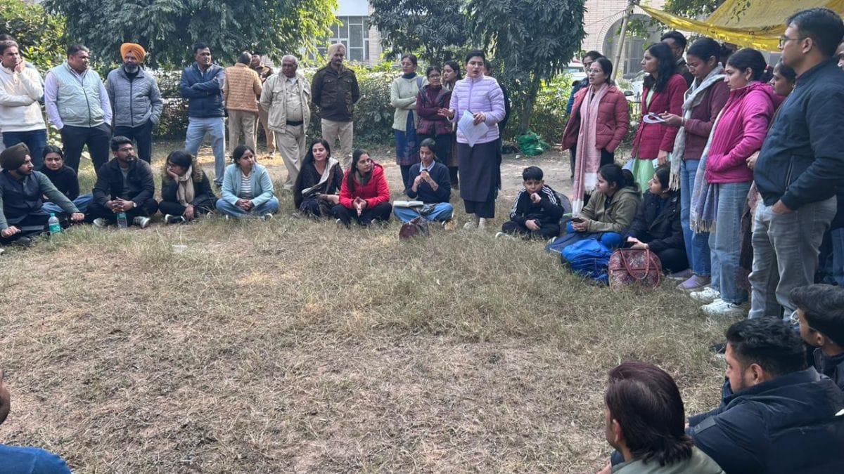 Candidates who failed to clear the subject knowledge exam of the HPSC for posts of English assistant professors outside the HPSC building in Panchkula | By special arrangement