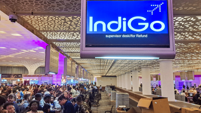 Stranded passengers at the IndiGo counter after several flights were cancelled at Chhatrapati Shivaji Maharaj International Airport in Mumbai on Friday | PTI