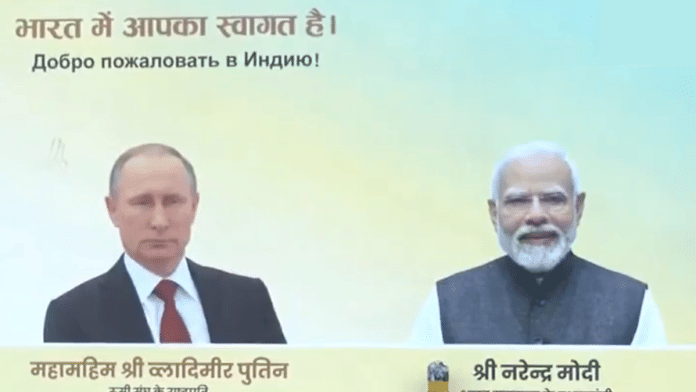 Flex boards welcoming Russian President Vladimir Putin and Russian national flags put up around Teen Murti Marg, Thursday, 4 December | X/@ANI